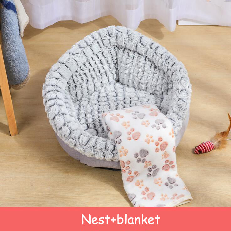 Grey plush pet bed with cat curled inside