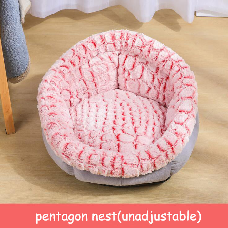 Pink plush pet bed with cat curled inside