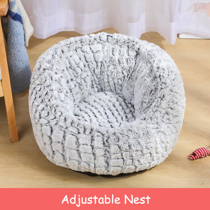 Grey plush pet bed with cat curled inside